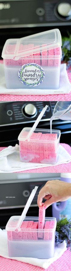 two trays filled with pink marshmallows on top of a stove