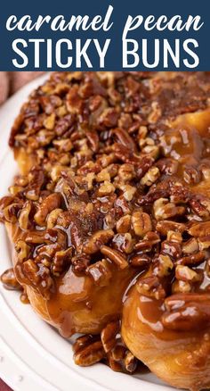 caramel pecan sticky buns on a white plate with text overlay that reads caramel pecan sticky buns