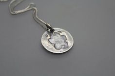 Cremation Necklace, Ashes Jewelry, Custom Cremation Jewelry, Cremation Paw Print, Custom Paw Print, Silver Jewelry With Paw Print For Anniversary, Silver Paw Print Jewelry For Anniversary, Silver Anniversary Jewelry With Paw Print, Silver Paw Print Round Pendant Necklace, Silver Necklace With Paw Print For Gift, Silver Jewelry With Paw Print, Sterling Silver Paw Print Necklace, Pet Paw Print, Paw Print Necklace