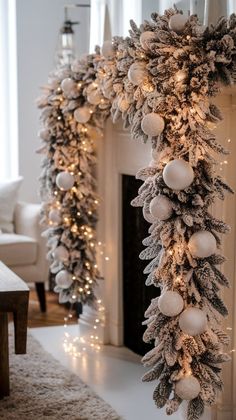 a fireplace decorated with christmas decorations and garlands on it's mantle in front of a fire place