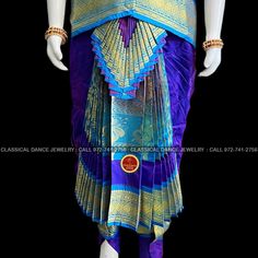 Design by Classical Dance Jewelry® ❥ Traditional Bharatanatyam costume wore during regular dance programs or arrangetram performance. ❥ Material : Art Silk ❥ Type : Traditional pant costume ❥ Easy to wear ❥ layer front fan ❥❥❥❥ 30 inch PANT LENGTH Dress Measurements ( all the measurements approximately 1 -2 margin buffer) Age: 7 - 9 yrs ❥ PANT MEASUREMENTS: ☛ Pant Length: 29-30 inch ☛ Pant Waist: 27-28 inch ☛ Pant Hip: 28-29 ❥ BLOUSE MEASUREMENTS: ☛ Blouse length: 10-11 inch ☛ Blouse Shoulder : Royal Blue Traditional Wear For Puja And Diwali, Royal Blue Traditional Wear For Puja, Royal Blue Traditional Drape For Puja, Traditional Art Silk Sets With Latkans, Traditional Royal Blue Wear For Diwali, Royal Blue Traditional Wear For Diwali, Traditional Blue Sets For Puja, Traditional Purple Sets For Puja, Ceremonial Blue Traditional Wear With Pallu