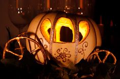 an image of a pumpkin in the shape of a horse drawn carriage with eyes on it