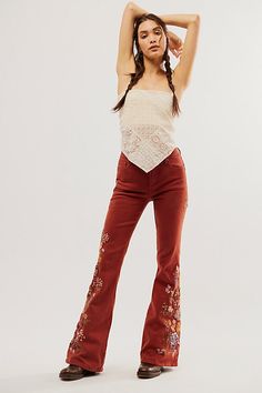 So special in a vintage-inspired design, these classic denim jeans from Driftwood are featured in a high-rise, flare silhouette with exaggerated floral embroidery at sides for added dimension. * Zip-fly and button closure * Five pocket design * Soft, stretch denim | Driftwood Farrah Embroide Flare Jeans at Free People in Red, Size: 26 S Unique Rave Outfits, All Jeans, Red Fits, Embroidered Jeans, Vintage Inspired Design, Bottom Clothes, Pocket Design, Boho Outfits, Floral Embroidery