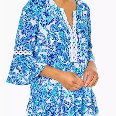 Brand New With Tag Lilly Pulitzer Hollie Tunic Top Turquoise Oasis Shell Me You Love Me. Size L. Easy-Breezy Is The Vibe Of Our Hollie Tunic Top. The Straight-Fit Design Is Made From Soft Washed Rayon And Has 3/4-Length Sleeves With Flounced Cuffs. An Allover Print Adds A Final Pop Of Sunny Day Style. * 28 1/2" Straight Fit, Pullover Tunic With 3/4-Length Sleeves. * Tunic Rayon (100% Rayon). * Machine Wash Cold, Separately, Delicate Cycle. Tassel Shirt, Cotton Tunic Tops, Hooded Tunic, Embroidered Tunic Top, Velour Tops, You Love Me, Women Tunic Tops, Knit Tunic, Sunny Day