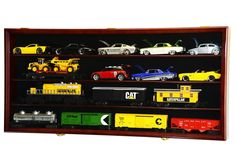 a wall mounted display case filled with different types of toy cars