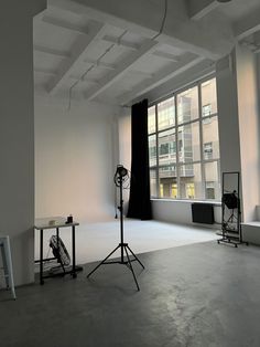 an empty room with light and equipment in it