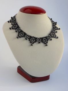 Black necklaces for women Beaded necklace Beaded jewelry necklace Weaving beads necklace Handmade choker collar necklace  This beautiful necklace handmade from quality Czech materials. The necklace is very flexible and convenient. In a necklace clasp used to regulate the length of the necklace. The length of the necklace around the circumference 40-42 cm. If there is a need can make for your size. Custom orders welcome. Let me know if you want a something special that yon not find yet. Anyway thank you for interest in to my work. Be beautiful. :) And finally please look at some of this simple advice which help you care for your beaded necklace: 1) Better not to bend and twist necklace. Best to store it in a separate envelope or casket away from sunlight and moisture. 2) To clean your neckl Black Beads For Jewelry Making Choker, Elegant Beaded Choker Necklace With Spacer Beads, Elegant Choker With Colorful Round Beads, Elegant Black Choker With Colorful Beads, Weaving Beads, Black Necklaces, Handmade Chokers, Beaded Jewelry Necklaces, Choker Collar Necklace