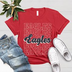 Favorite Team Shirt, Custom Team T-Shirt, Team Mascot Shirt, School Logo Shirt, School Team Tee, Personalized School Team Shirt, Team Shirt F I T ∙ & ∙ S I Z I N G : -->These Unisex T-shirts have a modern-fit. Consult the size chart in the pics for an accurate fit. -->Women's sizes are narrower than the waist. -->Sleeves are rolled up in some product pictures. They do not come rolled up on delivery. T I M E ∙ T O ∙ D E L I V E R Y : -->Processing and production time is 1-2 business days. -->Deli Game Day Relaxed Fit Short Sleeve Tops, Casual College Shirt With Team Name, Relaxed Fit Short Sleeve Tops For Game Day, Red T-shirt With Name Print For Game Day, Casual T-shirt With Text Print For Game Day, Casual Text Print T-shirt For Game Day, Red Crew Neck T-shirt With Name Print, Graphic Tee T-shirt With Team Name For Summer, Graphic Tee For Game Day With Short Sleeves