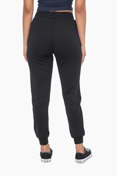 Unleash your inner athlete with our Everyday Comfort Jogger. Made from a soft and stretchy blend, these joggers feature an elastic waistband with a drawstring and convenient zippered pockets. Perfect for lounging or on-the-go, these cuffed joggers offer both comfort and style in one. Model is 5'8" Size 2 and wearing a Size Small. AP7013 Sporty Workout Bottoms With Elastic Cuffs, Gym Joggers With Elastic Side Panels, Athleisure Sweatpants With Drawstring For Workout, Cotton Drawstring Joggers For Workout, Athleisure Drawstring Sweatpants For Workout, Athleisure Joggers With Elastic Cuffs For Workout, Sporty Activewear With Elastic Cuffs For Workout, Athleisure Sweats With Drawstring For Jogging, Athleisure Joggers With Ribbed Waistband For Jogging