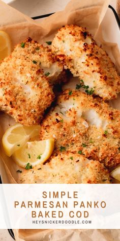 chicken parmesan panko baked with lemons and parsley on the side