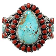 Navajo artist Tyler Brown is known for his cluster work, it is the style he is collected for. This cuff combines two of the Southwest's favorites, turquoise and coral. The three turquoise stones are pieces of Number Eight that has a light blue color with hints of that legendary honey colored spider web matrix. Surrounding the American classic is deep red Mediterranean Coral stones. Tyler fills the silver with silver drops, twisted wire, and a mirror shine. A five-wire bracelet shank displays the Tyler Brown, Number Eight, Brown Bracelet, Turquoise And Coral, Coral Stone, Twisted Wire, Honey Colour, Handcrafted Artisan Jewelry, Turquoise Stones