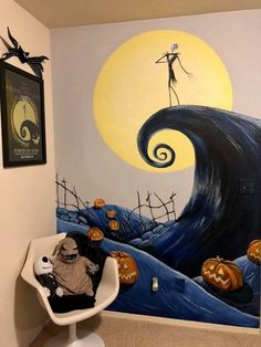 a child's room decorated for halloween with pumpkins