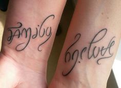 two people with matching tattoos on their arms that say family, love and marriage written in cursive font