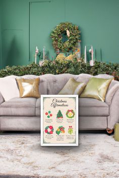 a couch with christmas decorations on it in front of a green wall and wreaths