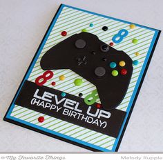 a birthday card with a video game controller