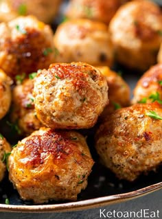 cooked meatballs in a bowl with parsley and seasoning on the side, ready to be eaten