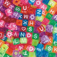 the letters are made up of small plastic cubes that spell out words and numbers