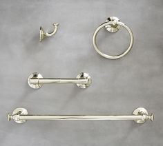 three piece bathroom set in polished brass finish with towel bar, toilet paper holder and ring handles