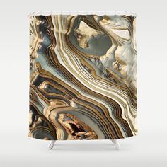 a shower curtain with an abstract marble pattern