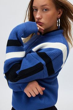 Retro-inspired BDG sweater in an oversized, slouchy fit. Designed in a midweight knit featuring a high stand collar, drop shoulder long sleeves and a ¼ zip front. Exclusively at Urban Outfitters. Features BDG Theo quarter zip pullover sweater Oversized ¼ zip sweater Midweight knit Stand collar with drop shoulder long-sleeves Quarter zip front Oversized, slouchy fit Cropped length Adjustable zip Easy pull-over style UO exclusive Content + Care 100% Acrylic Machine wash Imported Size + Fit Model i