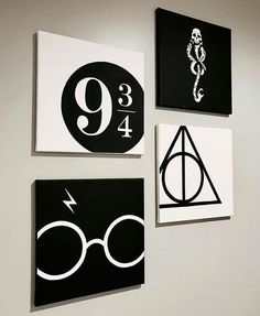 three harry potter signs are hanging on the wall