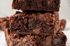 chocolate brownies stacked on top of each other