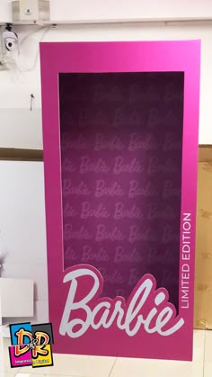 a barbie photo frame with the word barbie written on it in pink and white lettering