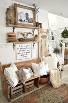 a living room filled with lots of furniture and decor on top of a wooden shelf