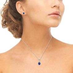 This classic jewelry set showcases an oval halo pendant necklace and matching stud earrings. The necklace showcases a sparkling oval 8x6mm created blue sapphire gemstone surrounded by a halo of white topaz stones. The pendant measures 20mm in the height and 9.45mm in the width, it dangles from a thin 18-inch rolo chain. The stud earrings feature a pair of oval 7x5mm created blue sapphire gemstones surrounded by white topaz stones. The earrings measure 10.6mm height and 8.6mm in the width, they s Turquoise Heart Necklace, Dainty Pendant Necklace, Dainty Choker Necklace, Crown Necklace, Halo Necklace, Solitaire Necklace, Round Solitaire, Solitaire Pendant Necklace, Solitaire Necklaces