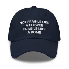 This dad hat is not just for dads! Our Fragile Like A Bomb Dad Hat is comfortable, comes in a variety of colors and is the perfect accessory for everyday streetwear. It's a classic cotton dad hat with an adjustable strap and a funny saying, expertly embroidered on the front. • 100% chino cotton twill • Green Camo color is 35% chino cotton twill, 65% polyester • Unstructured, 6-panel, low-profile • 6 embroidered eyelets • 3 ⅛” (7.6 cm) crown • Adjustable strap with antique buckle • One size fits most - See size guide • Actual color may be slightly different from the image due to different monitor and light effects.Size guide A (inches) B (inches) C (inches) D (inches) One size 23 ⅝-24 ⅜ 4 ¾ 2 ¾ 7 ½ A (cm) B (cm) C (cm) D (cm) One size 60-62 12 7 19 Boyfriend Hat, Not Fragile Like A Flower, Everyday Streetwear, How To Have Style, Silly Clothes, Weird Holidays, Fettuccine Alfredo, Funny Hats, Happy Design