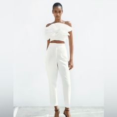 Zara High-Waisted Pants Saize Xs Color White High Waisted Pants With Pronounced Seams At Front And Back. Front Welt Pockets. Front Zip, Metal Hook, And Inside Button Closure. 7102/562 White Cropped Bottoms For Party, Cropped White Party Bottoms, Fitted Cropped Pantsuit For Spring, White Ankle-length Pants For Party, Spring Cropped Fitted Pantsuit, Elegant Cropped Pants For Work, Elegant White Cropped Bottoms, Chic White Tapered Leg Bottoms, Chic Fitted Cropped Bottoms