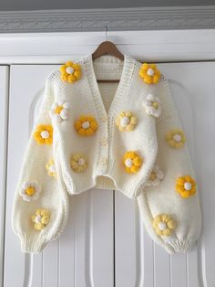 It is 100% handmade. You will be amazed by its unique stitching and knitting. It is a product you can use in all seasons. You can ask your questions about color and size in the message section. Knitted to order, color change and You can write your special orders in the message section. Products are prepared with love and care ❤️ A soft gift that will warm the hearts of your loved ones can be perfect 🎁 WASHING Do not put it in the washing machine or dryer, it requires hand washing. SHIPPING 🚚 S Cute Cropped Cardigan Outfits, Cute Cardagins, Handmade Cardigan Knitting, Cardigan Design Pattern, Crochet Cardigan With Flowers, Handmade Knit One-size Cardigan, Handmade Knit Cardigan In One Size, Handmade One-size Knit Cardigan, Handmade White Knit Sweater