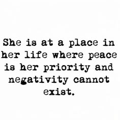 a black and white photo with the words she is at a place in her life where peace is her priority and negativeity cannot