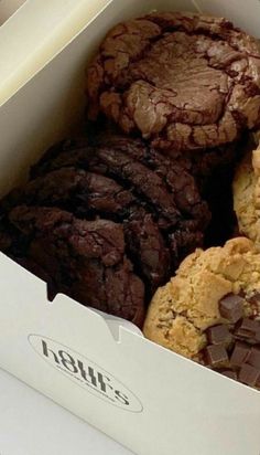 a box filled with chocolate cookies and cookies