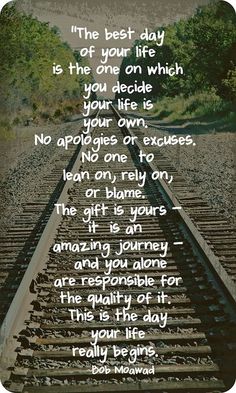 a train track with an inspirational quote on the bottom and words above it that read,'the best day of your life is the one on which your decide your life