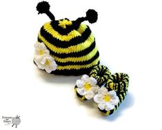 a crocheted hat with flowers on it