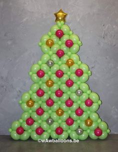 a christmas tree made out of balloons