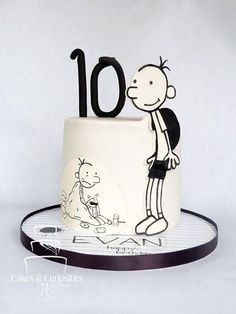 a birthday cake with a cartoon character on the top and number 10 on the bottom