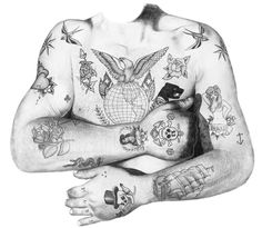 a man with tattoos on his chest and arms