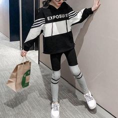 2-piece Color-block Hoodie & Pants for Girl - PrettyKid Black Hooded Cotton Set, Casual Patchwork Sets For Winter, Black Hooded Sets For Fall, Playful Black Sets For Spring, Trendy Black Sets For Winter, Black Hooded Fall Sets, Trendy Black Winter Sets, Playful Black Spring Sets, Black Cotton Sets For Fall