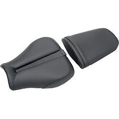 two black leather seat covers for a motorcycle