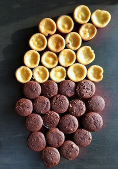 chocolate cupcakes arranged in the shape of an eiffel tower