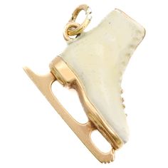 This is a beautiful vintage winter charm. The figure ice skate charm pendant is created with enamel and 14 karat gold. The ice skate is gorgeous with the gold shoelace, blade and heel while the shoe is made of white enamel. The great thing about charms is that you can collect them as wearable memories and add them to your necklace, charm bracelet or layered with your other favorites. The ice skate is in very good condition and of high quality. The charm measures 2.1 cm in length without bail, he Figure Ice Skates, Gold Enamel, Ice Skating, White Enamel, Pandora Charms, Charm Pendant, Shoe Laces, Charms, Gold Jewelry