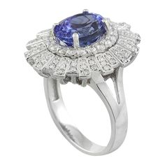 Stamped: 14K Total Ring Weight: 7.4 Grams Tanzanite Weight 3.69 Carat (9.80x7.90 Millimeters)Diamond Weight: 0.80 carat (F-G Color, VS2-SI1 Clarity )Face Measures: 21.45x19.30 Millimeter SKU: [600834] Luxury Oval Tanzanite Diamond Ring, Gia Certified Oval Tanzanite Diamond Ring, Elegant Sapphire Ring With Tanzanite And Polished Finish, Gia Certified Tanzanite Oval Rings, Gia Certified Oval Tanzanite Ring, Formal Tanzanite Diamond Ring, Oval Shape, Formal Tanzanite Diamond Ring Oval Shape, Oval Tanzanite Diamond Ring For Formal Occasions, Formal Oval Tanzanite Diamond Ring