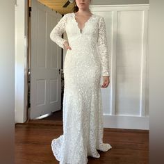 I Loved This Dress! It’s Unworn Other Than To Take Pictures, Used As A Backup Dress For My Other Wedding Dress. It’s A Heavier Material And Would Probably Work Best For A Fall/Winter Wedding. Form Fitting With A Little Train! I’m 5’8” And The Length Was Good (Without Heels). Would Fit A 6-8. Material Has Stretch, Just Not In The Arms. V-neck Wedding Dress With Sweep Train, V-neck Wedding Gown With Sweep Train, White V-neck Wedding Dress, Elegant Fitted Wedding Dress For Bridal Shower, Fitted Bridesmaid Gown With Lace Sleeves, Fitted Bodice V-neck Wedding Dress, Fitted V-neck Wedding Dress, Wedding Dress With Fitted Bodice And V-neck, V-neck Wedding Dress With Fitted Bodice