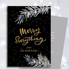 a black and gold christmas card with the words merry everything