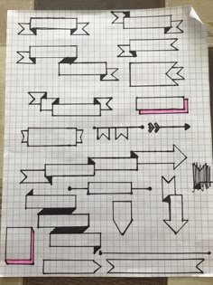 a piece of paper with arrows drawn on it and some pink lines in the middle