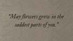 an old typewriter with the words may flowers grow in the radjet parts of you