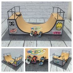 the skateboard ramp is made out of cardboard and has various stickers on it