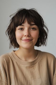 Effortlessly Elegant: Short Hair with Bangs You’ll Love Choppy A Line Bob, Shaggy Bob Bangs, Short Bob Cut With Bangs, Short Choppy Bob Haircuts, Short Choppy Bob, Short Choppy Bangs, Short Choppy Bobs, Haircut For Women, Choppy Bob Haircuts